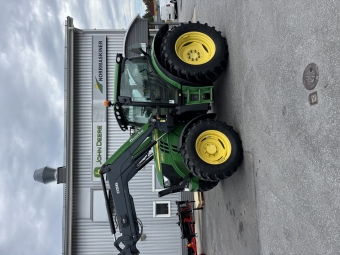 John Deere 6125R Premium Cab med l Q56-Lastare John Deere 6125R Premium 